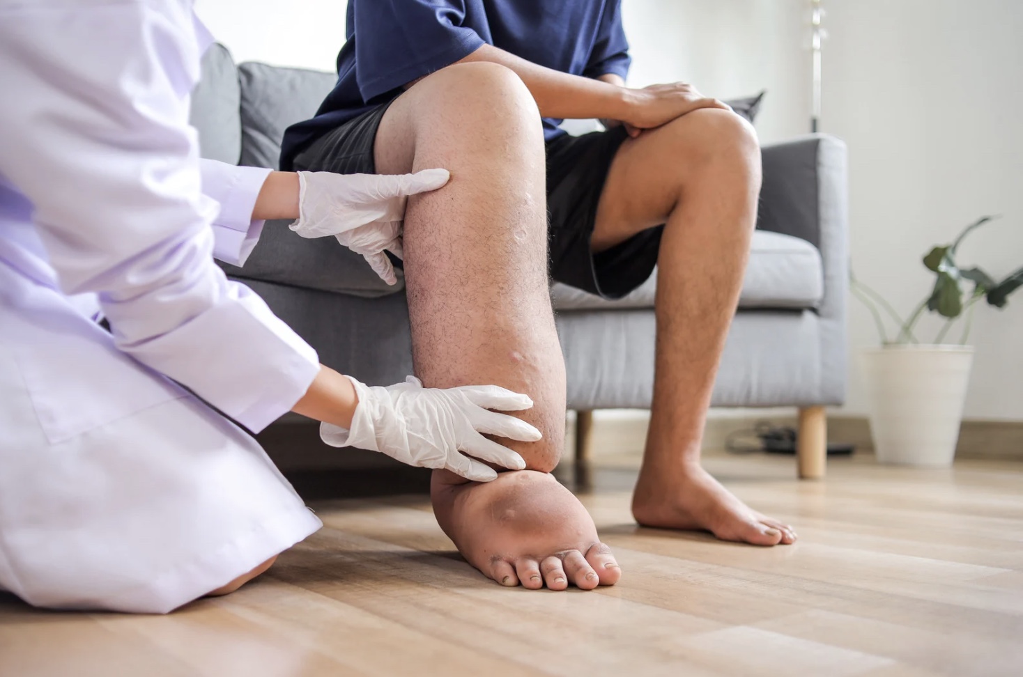 A certified therapist performing Manual Lymphatic Drainage (MLD) on a patient